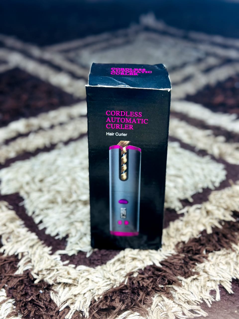 Cordless automatic hair curler